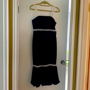 Rich blue shapely dress with side zip closure